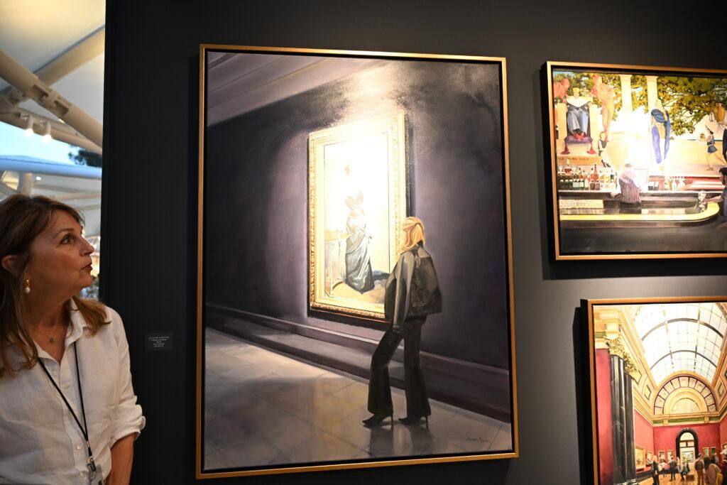 Susan Hoehn with her work, A Study in Contrast.  Image by Dan Sattel