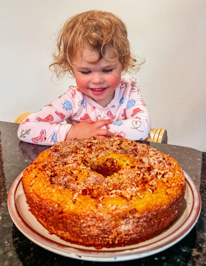 Rose and her pistachio cake.  Image by Katherine Rose Woller.  