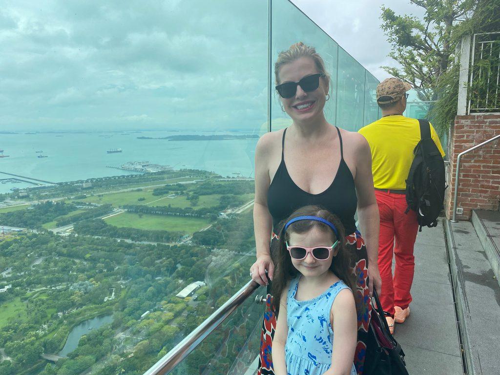 Christianne, Livia (and random stranger with yellow shirt) on top of Marina Bay Sands, Singapore. Image by Dan Sattel