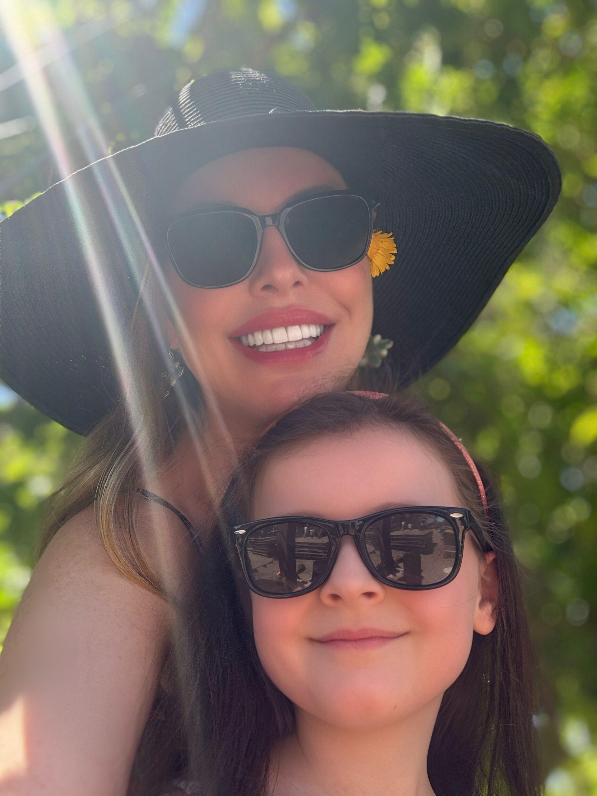 Christianne and Livia (plus flower) on a walk.  Image by Christianne Klein
